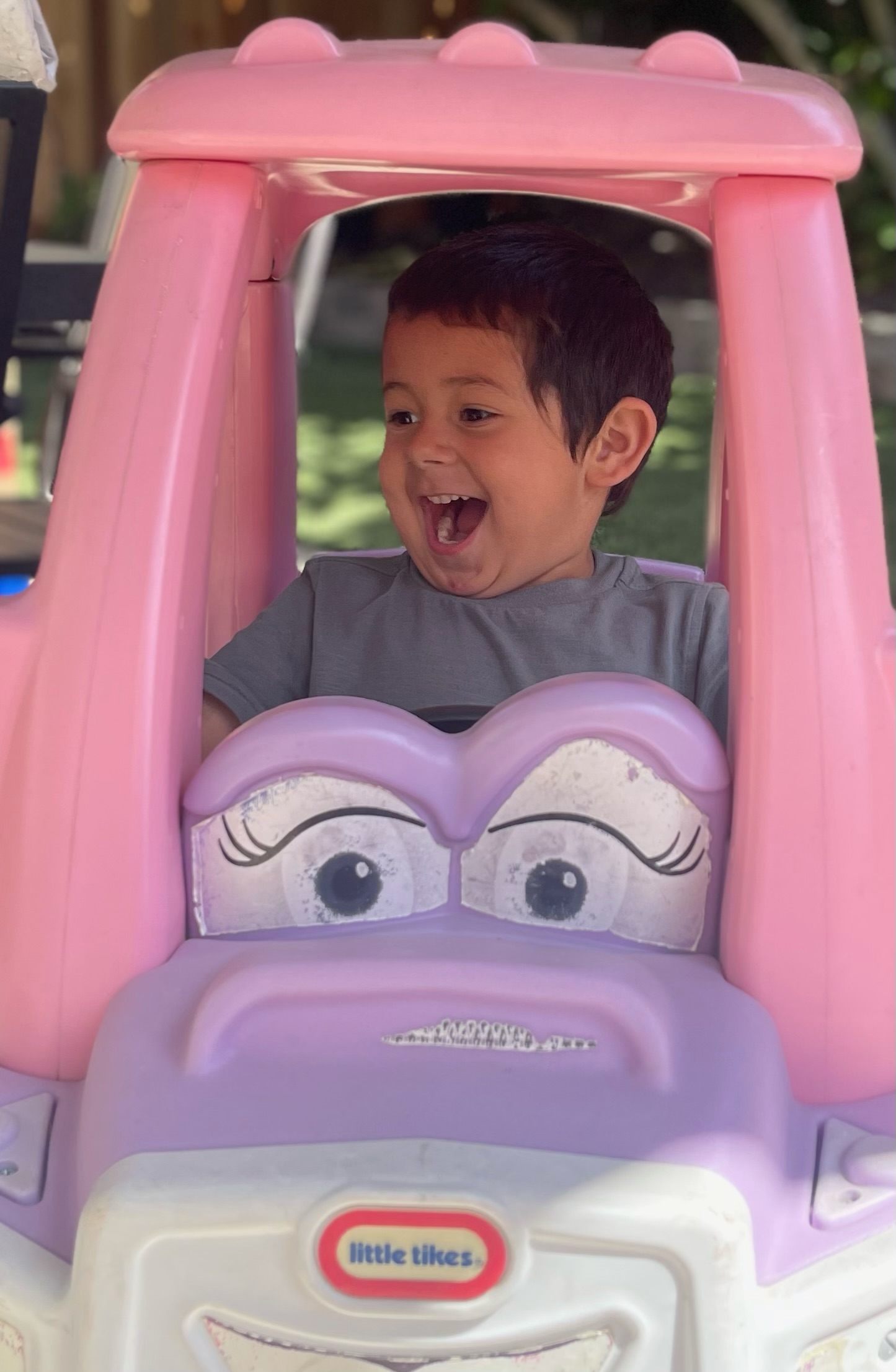 Happy young children smiling outdoors